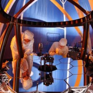GSFC_20171208_Archive_e002085_orig Engineers at Ball Aerospace test the Wavefront Sensing and Control testbed to ensure that the 18 primary mirror segments and one secondary mirror on JWST work as one. The test is performed on a 1/6 scale model of the JWST mirrors.
Credit: NASA/Northrop Grumman/Ball Aerospace
To read more about the James Webb Space Telescope go to: www.nasa.gov/topics/technology/features/partnerships.html
NASA Goddard Space Flight Center is home to the nation's largest organization of combined scientists, engineers and technologists that build spacecraft, instruments and new technology to study the Earth, the sun, our solar system, and the universe.